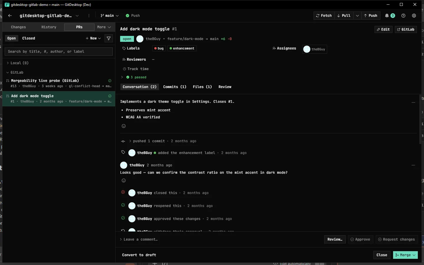 A GitLab merge request in GitDesktop: colored labels, a passing pipeline, an approval, a review comment, and the merge action